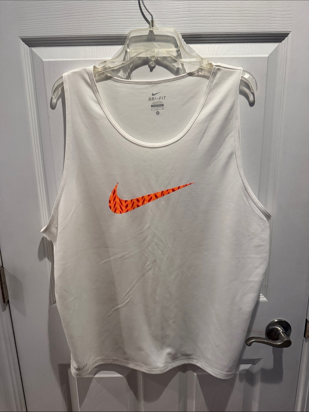 Nike White Sleeveless Dri-FIT Tank with Orange Patterned Swoosh